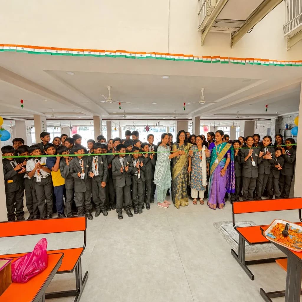 Ribbon-cutting ceremony at CMR School, Lalgadi Malakpet with students and leadership