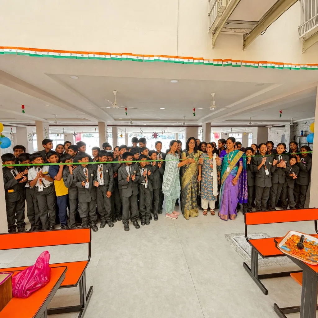 Ribbon-cutting ceremony at CMR School, Lalgadi Malakpet with students and leadership